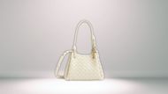 Parachute Small Intrecciato Leather Shoulder Bag (Image via bottegaveneta.com)